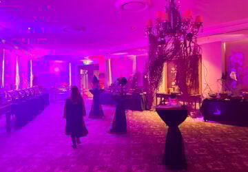 girl walking into the decorated room at the Wizardry High Tea at the Stamford Plaza